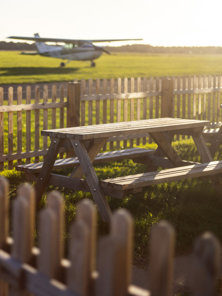 cafe outdoor benches tatenhill airfield - view of planes